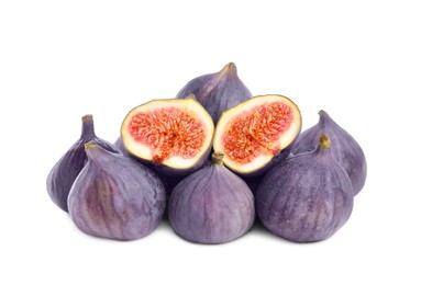 Whole and cut fresh ripe figs isolated on white