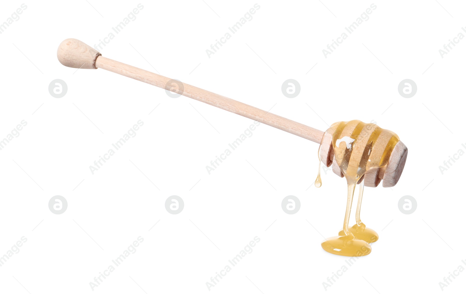 Photo of Natural honey dripping from dipper on white background