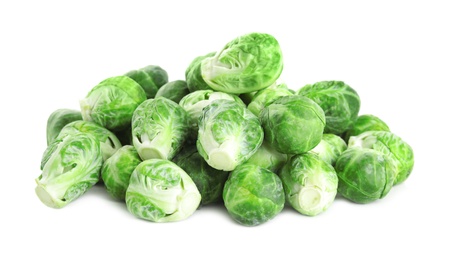 Pile of fresh Brussels sprouts isolated on white