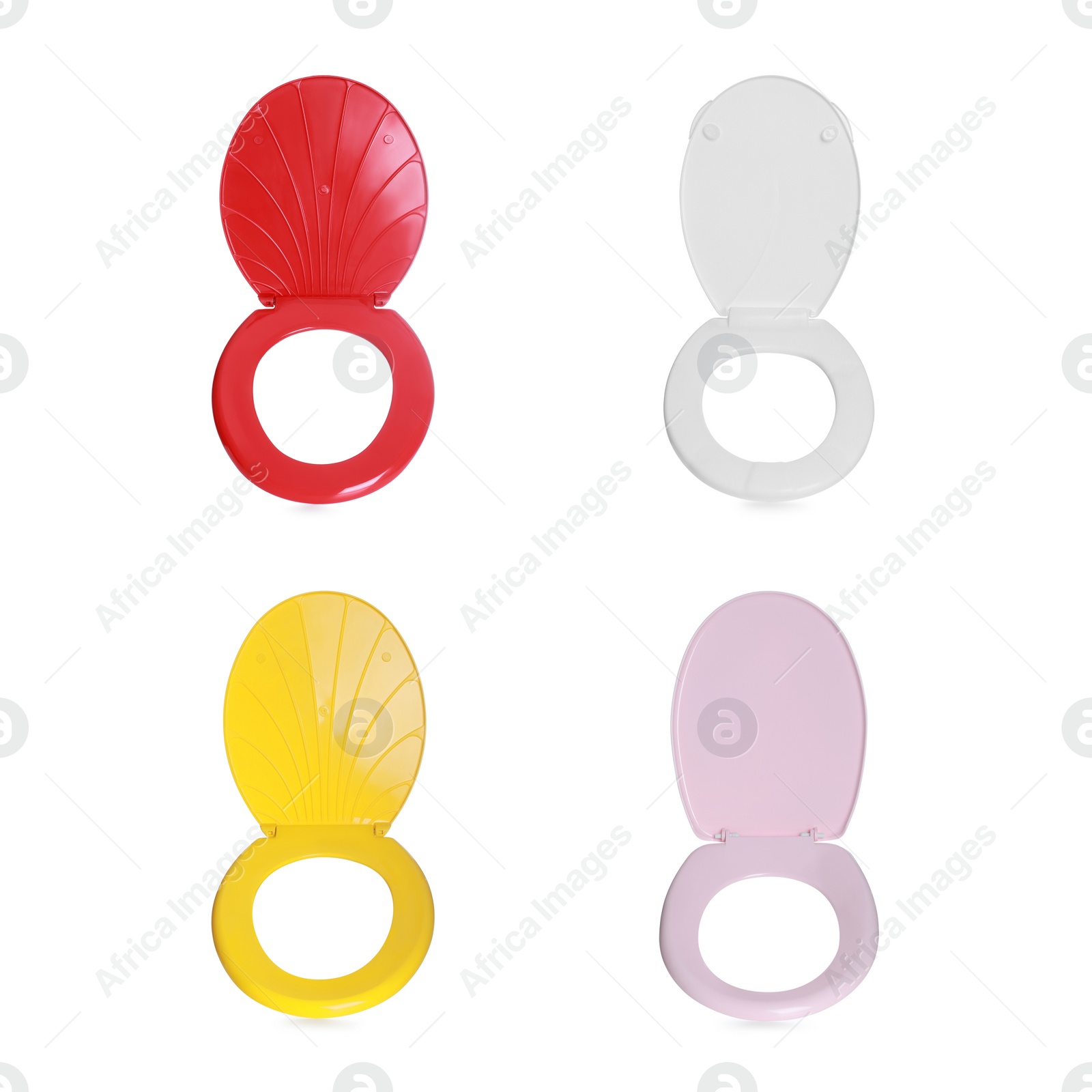 Image of Set with different plastic toilet seats on white background