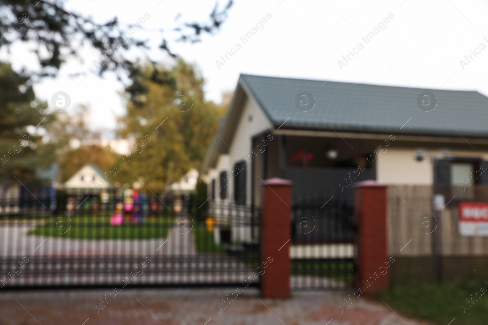 Photo of Beautiful houses outdoors, blurred view. Real estate for rent