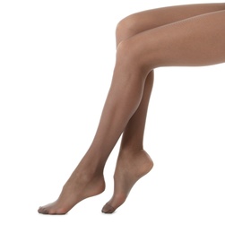 Photo of Legs of beautiful young woman in tights on white background, closeup