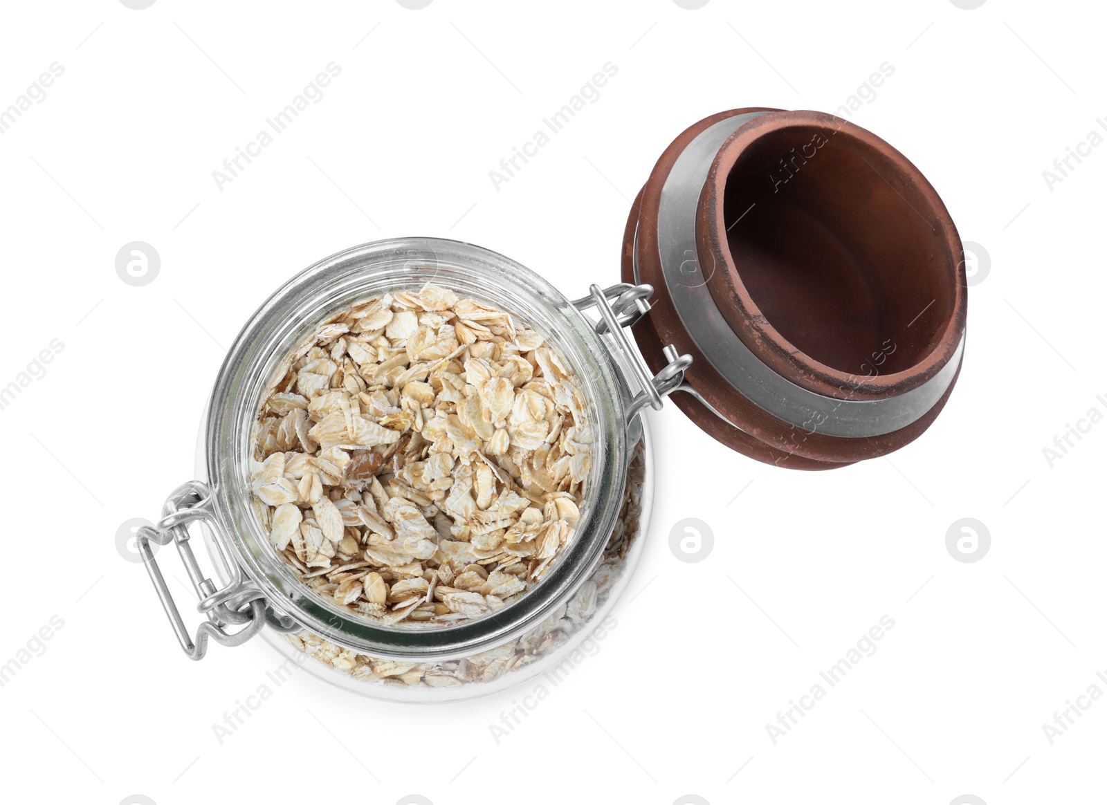 Photo of Raw oatmeal in glass jar isolated on white, top view