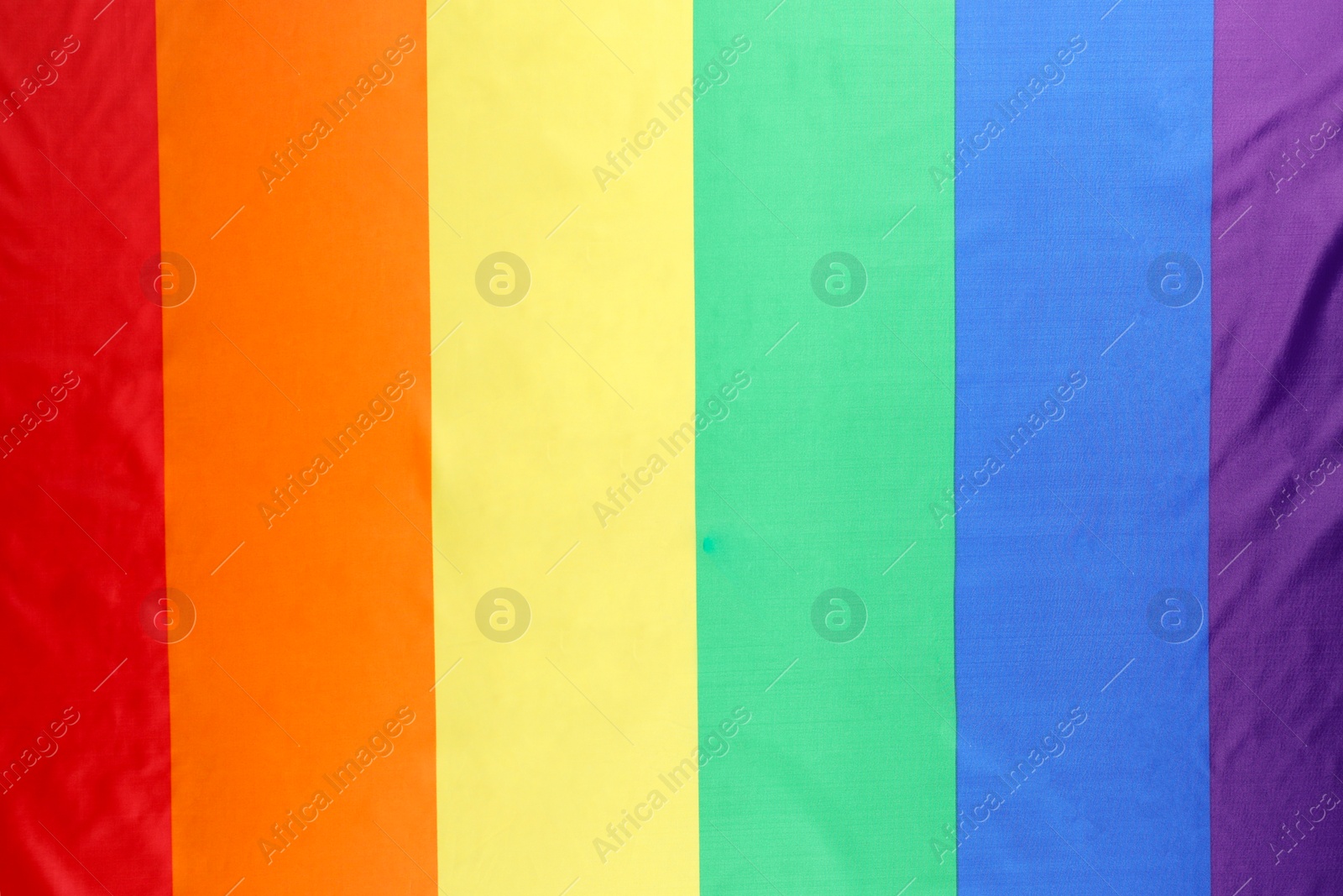 Photo of Rainbow LGBT flag as background, top view