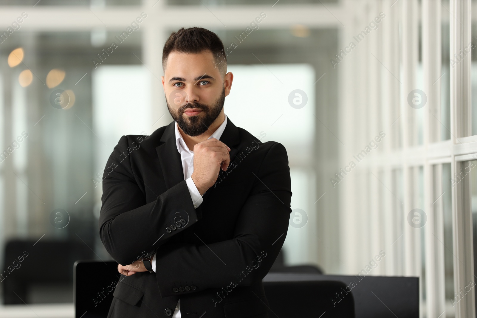 Photo of Portrait of confident man in office. Lawyer, businessman, accountant or manager