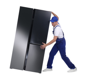 Photo of Professional worker carrying refrigerator on white background