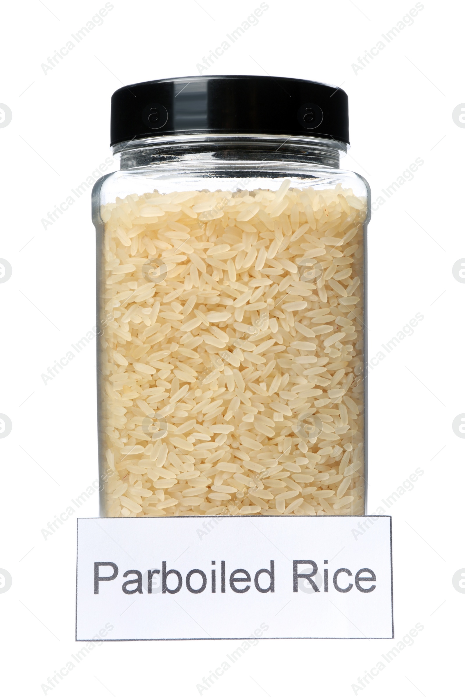 Photo of Parboiled rice in jar with label, isolated on white. Mock up for design