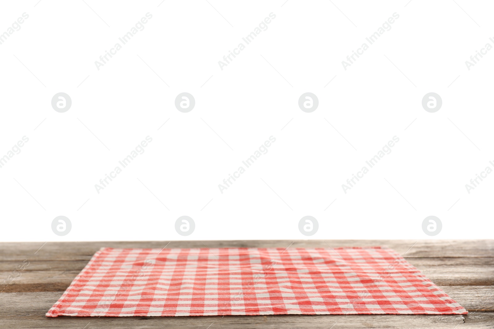 Photo of Checkered napkin on table against white background