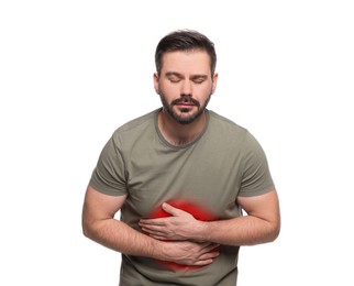 Man suffering from abdominal pain on white background