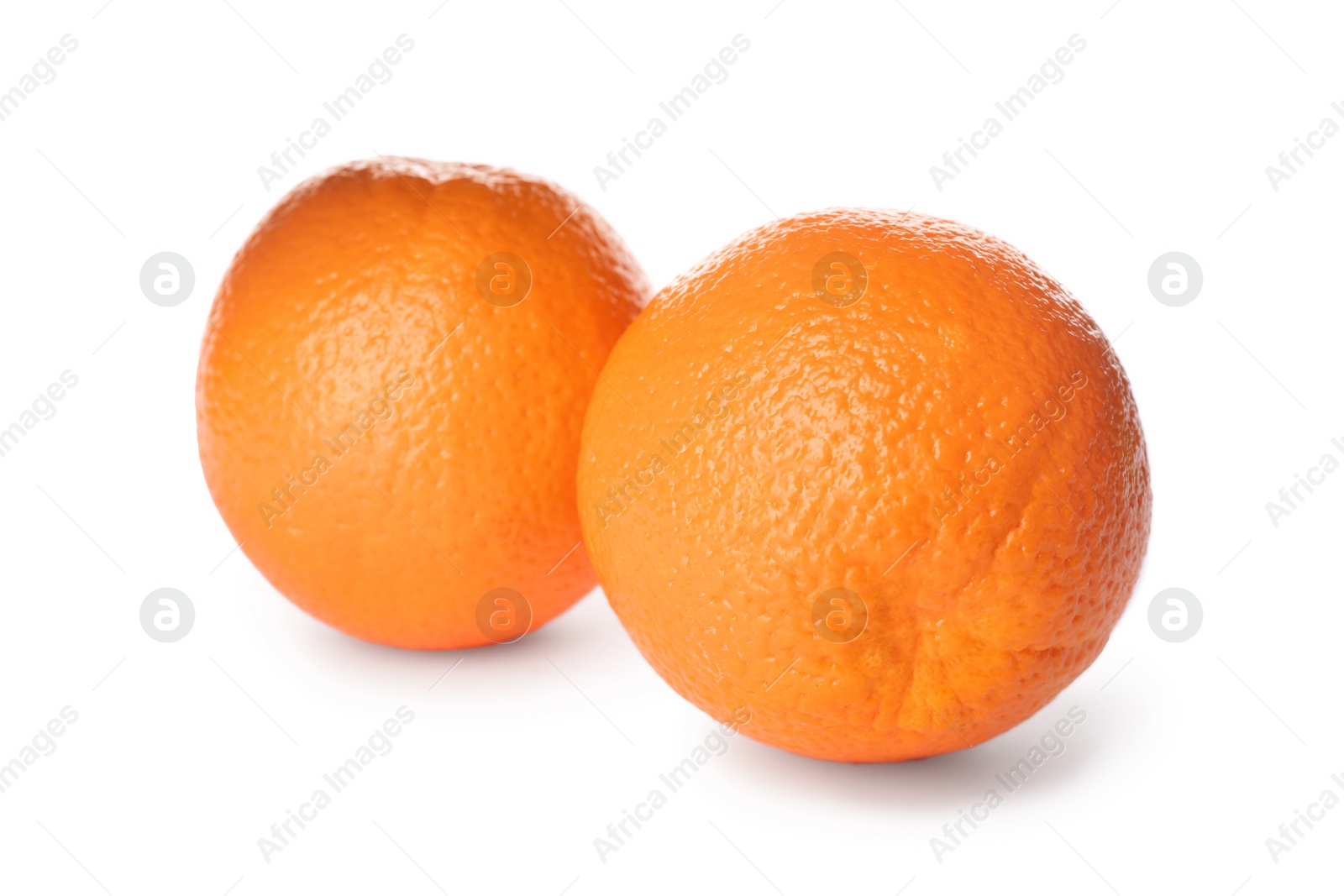 Photo of Delicious fresh ripe oranges on white background