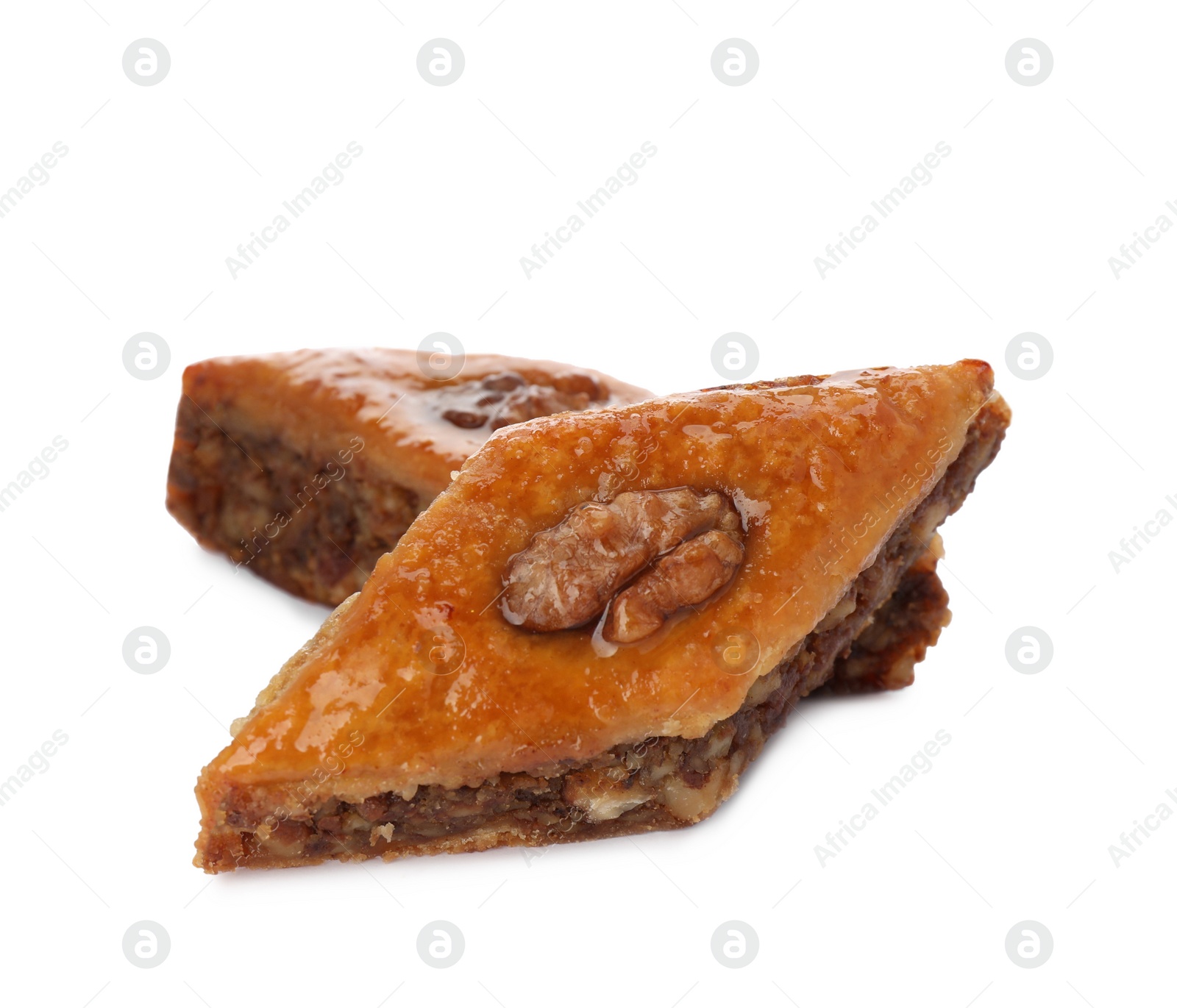 Photo of Delicious turkish baklava on white background. Eastern sweets