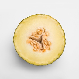 Half of ripe tasty melon on white background, top view