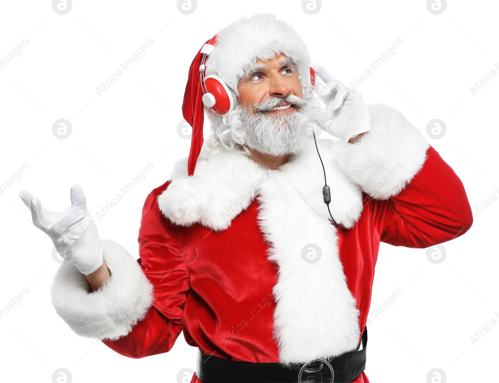 Photo of Santa Claus listening to Christmas music on white background