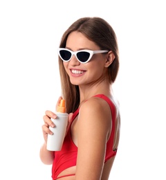 Photo of Woman with bottle of sun protection body cream on white background