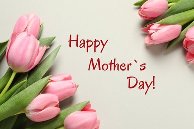 Image of Happy Mother's Day greeting card. Beautiful tulip flowers on beige background