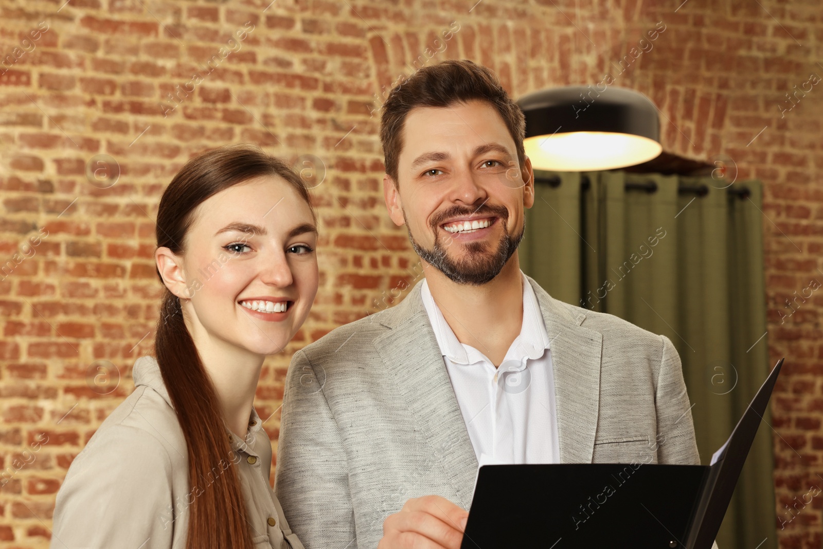 Photo of Portrait of happy employees in office. Team work