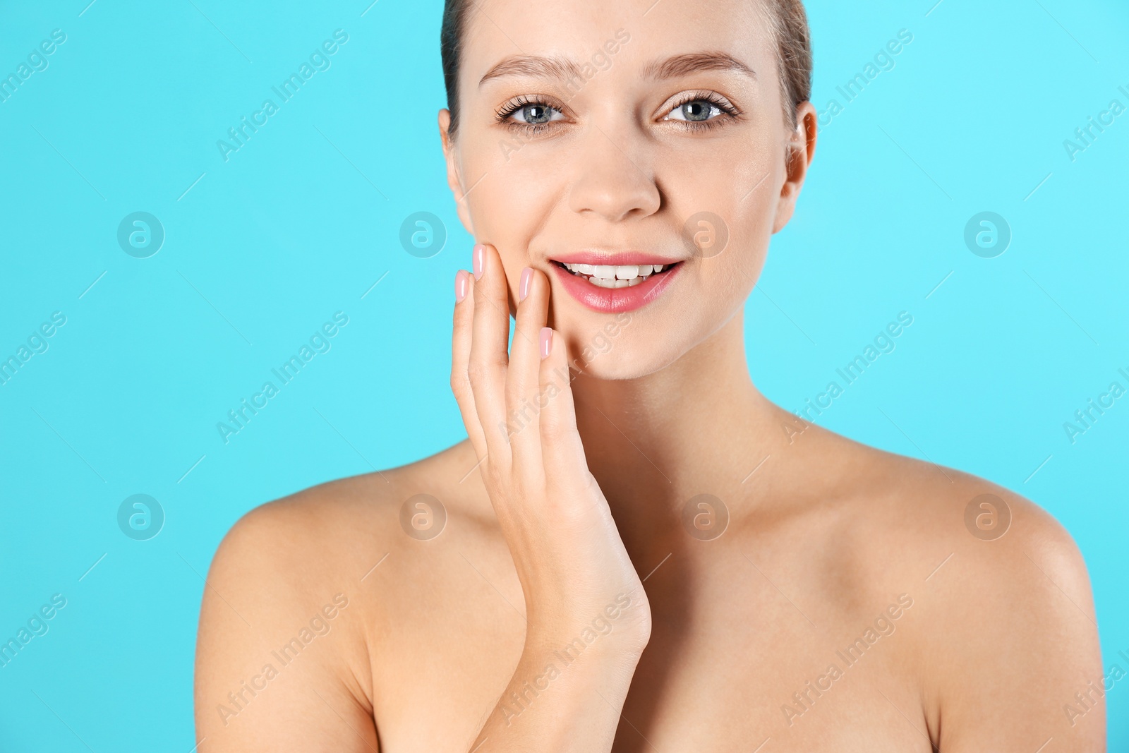 Photo of Portrait of beautiful young woman on color background. Lips contouring, skin care and cosmetic surgery concept