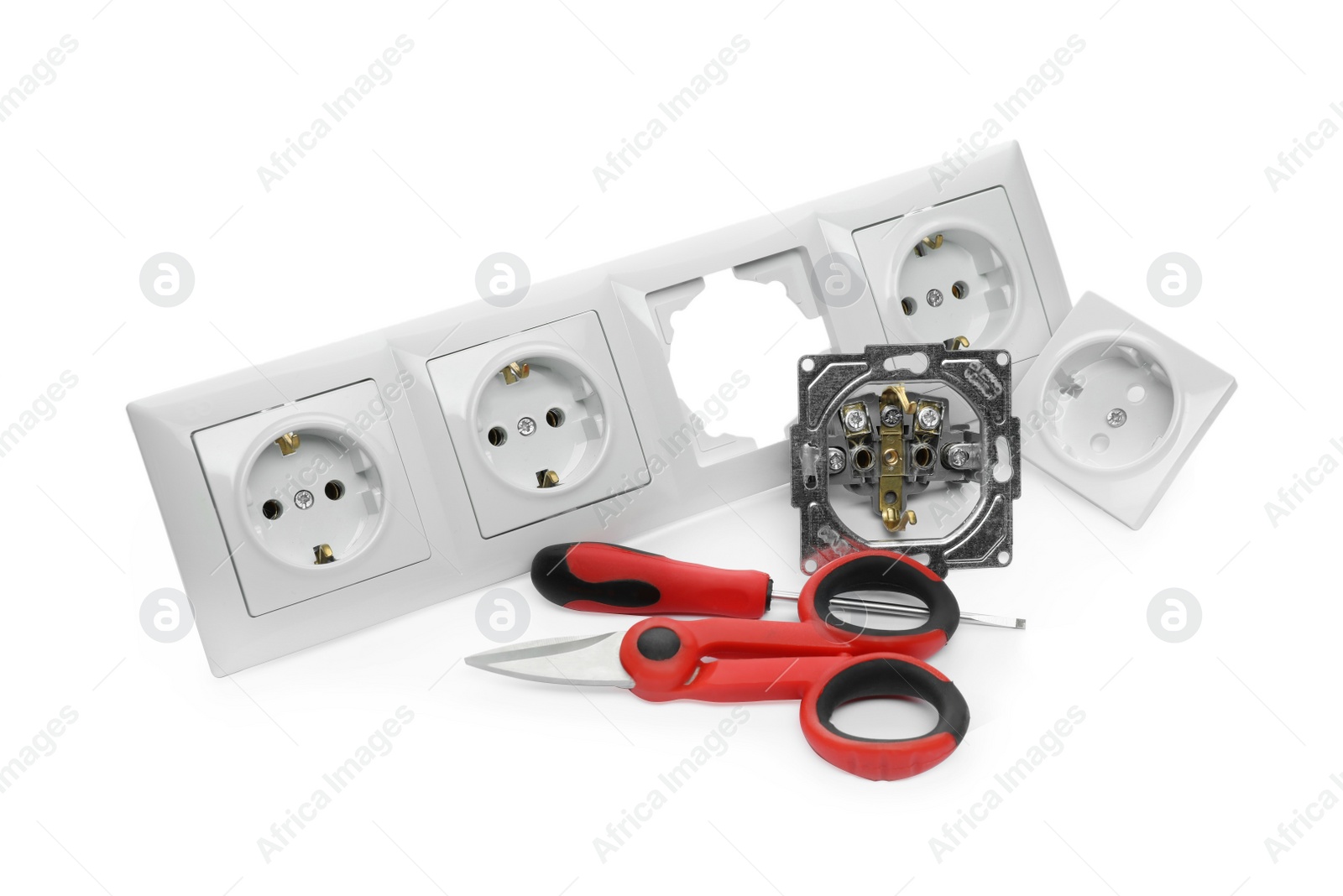 Photo of Set of sockets and electrician's tools isolated on white