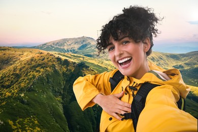 Image of Beautiful young woman taking selfie in mountains