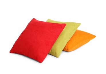 Different colorful decorative pillows on white background