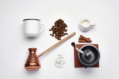 Photo of Flat lay composition with vintage manual coffee grinder on white background