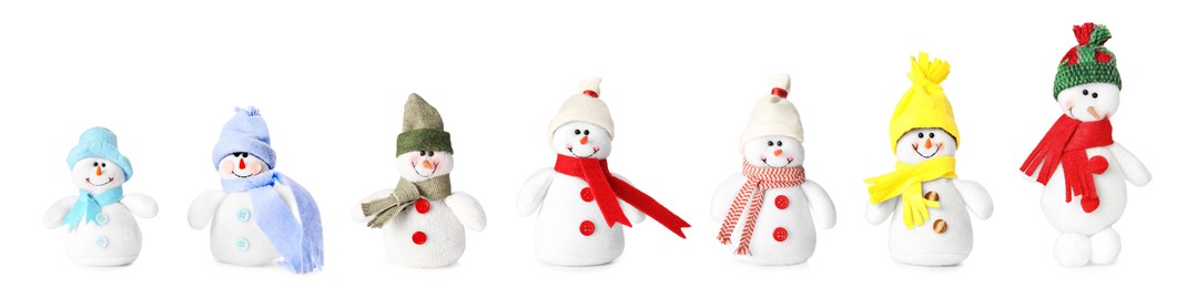 Image of Set with cute small snowman toys on white background. Banner design