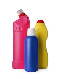 Photo of Bottles of different cleaning supplies on white background