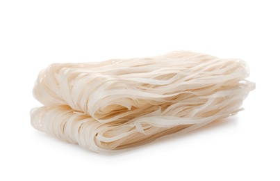Photo of Raw rice noodles on white background. Delicious pasta