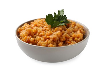 Photo of Delicious red lentils with parsley in bowl isolated on white