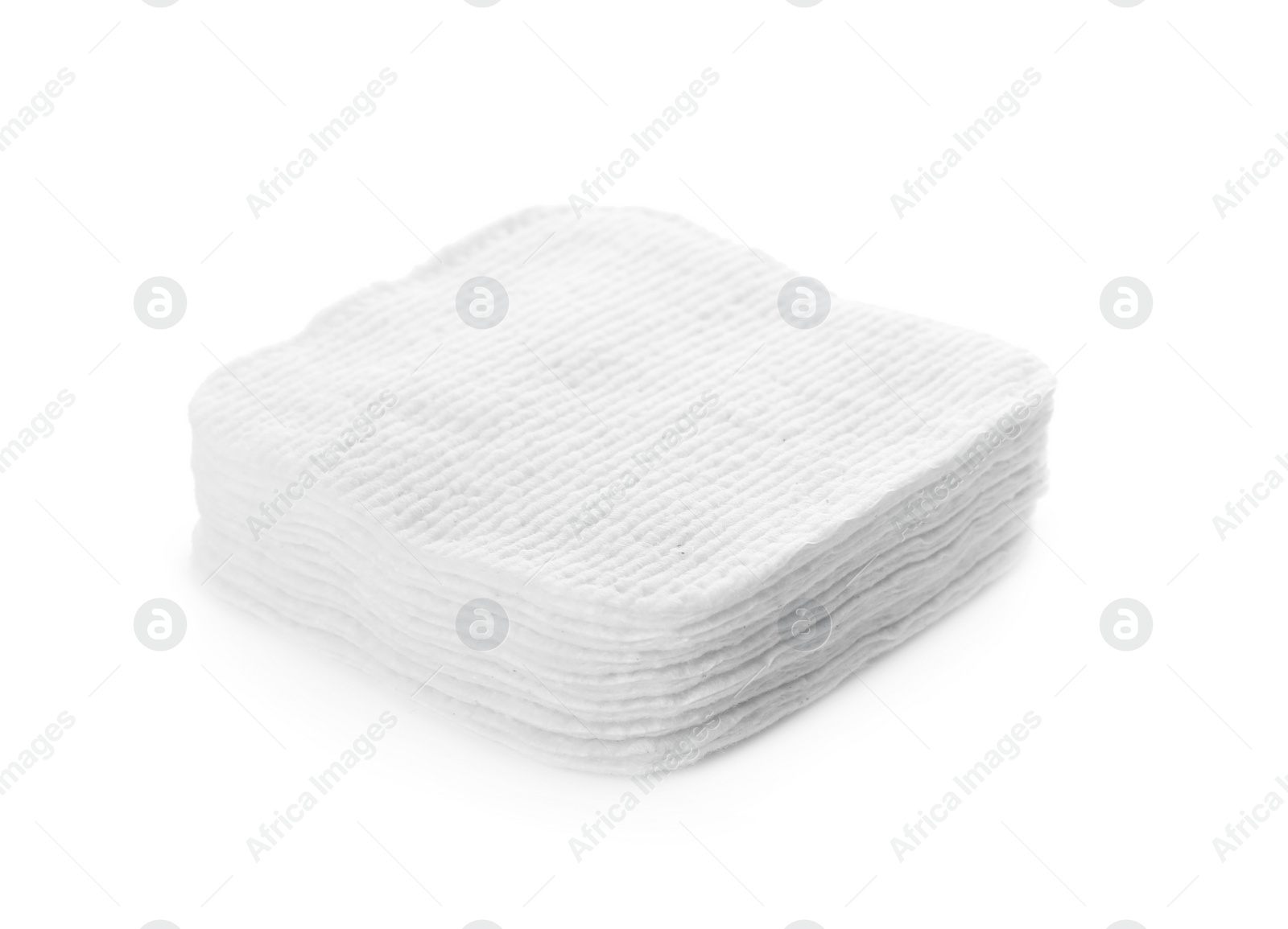 Photo of Stack of cotton pads on white background