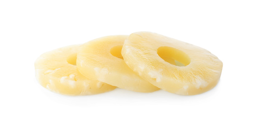 Photo of Delicious canned pineapple rings on white background