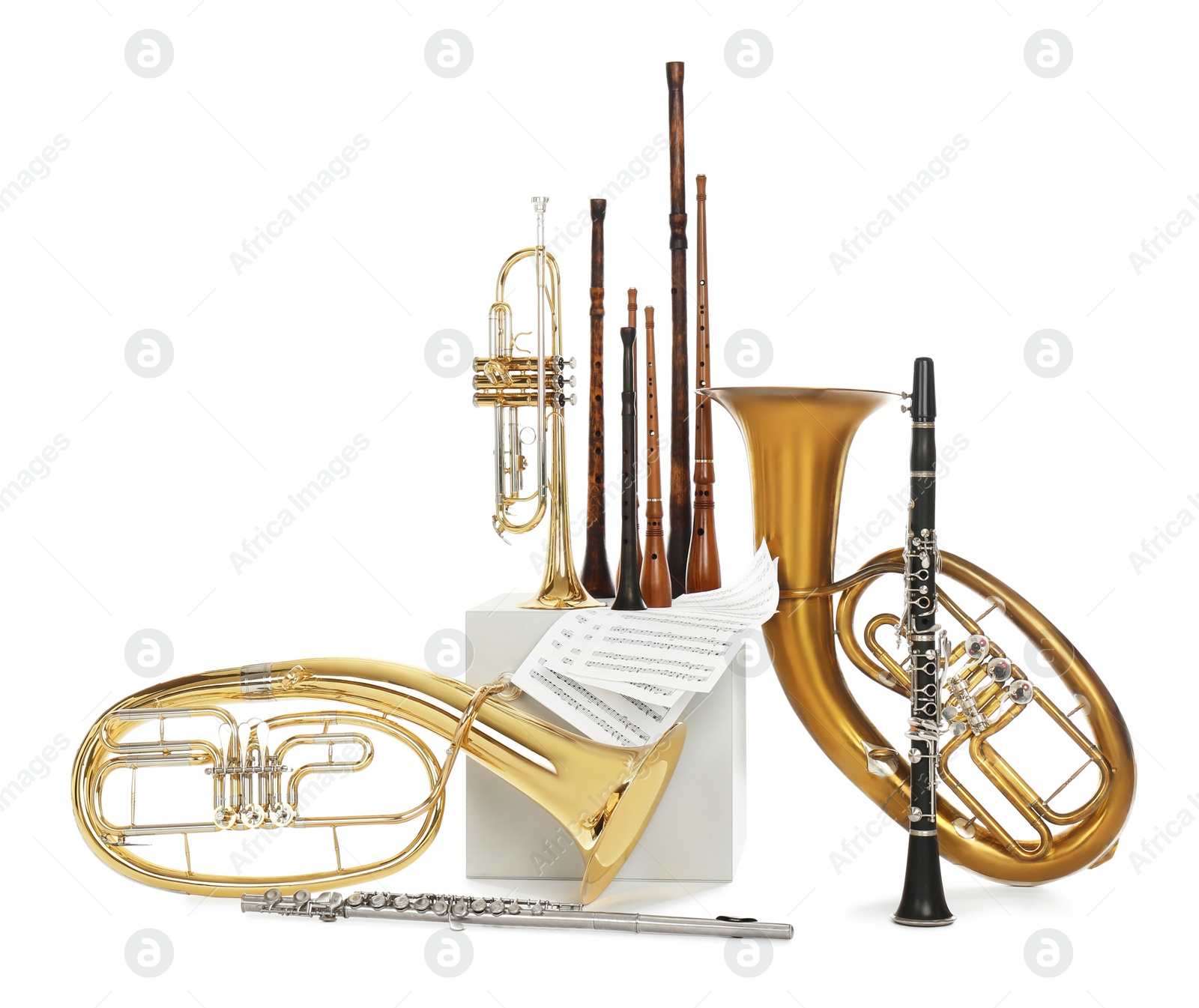 Photo of Set of wind musical instruments on white background