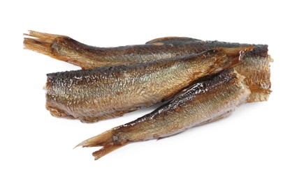 Tasty canned sprats isolated on white, top view