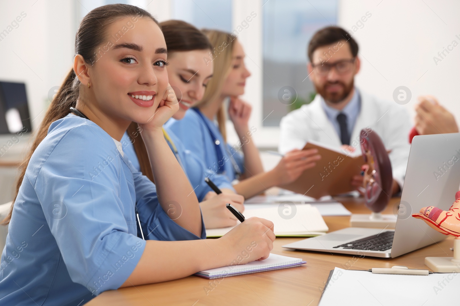 Photo of Portrait of young intern wearing uniform on lecture in university