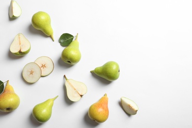 Ripe juicy pears on white background, top view