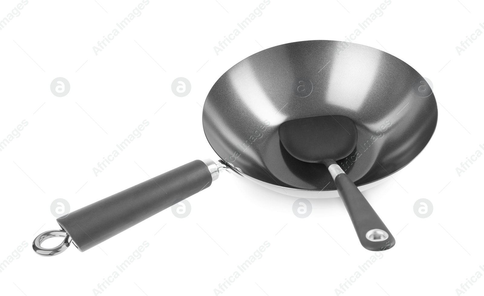 Photo of Metal wok and spatula isolated on white