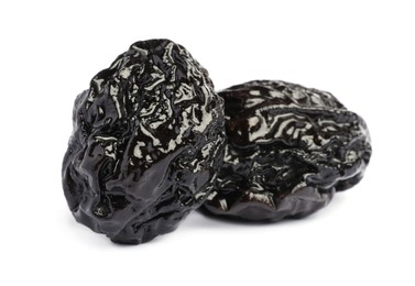 Sweet dried prunes on white background. Healthy snack