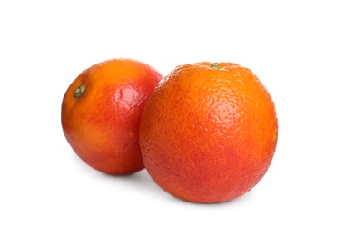 Photo of Whole ripe red oranges isolated on white