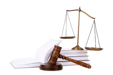 Wooden gavel, books and scales of justice on white background