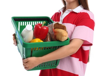 Young woman with shopping basket isolated on white, closeup