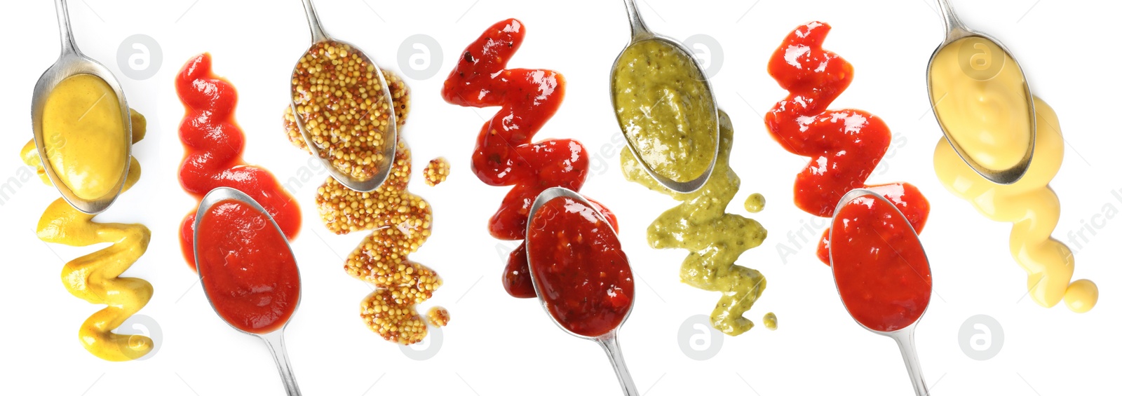 Image of Set of spoons with different delicious sauces on white background, top view. Banner design