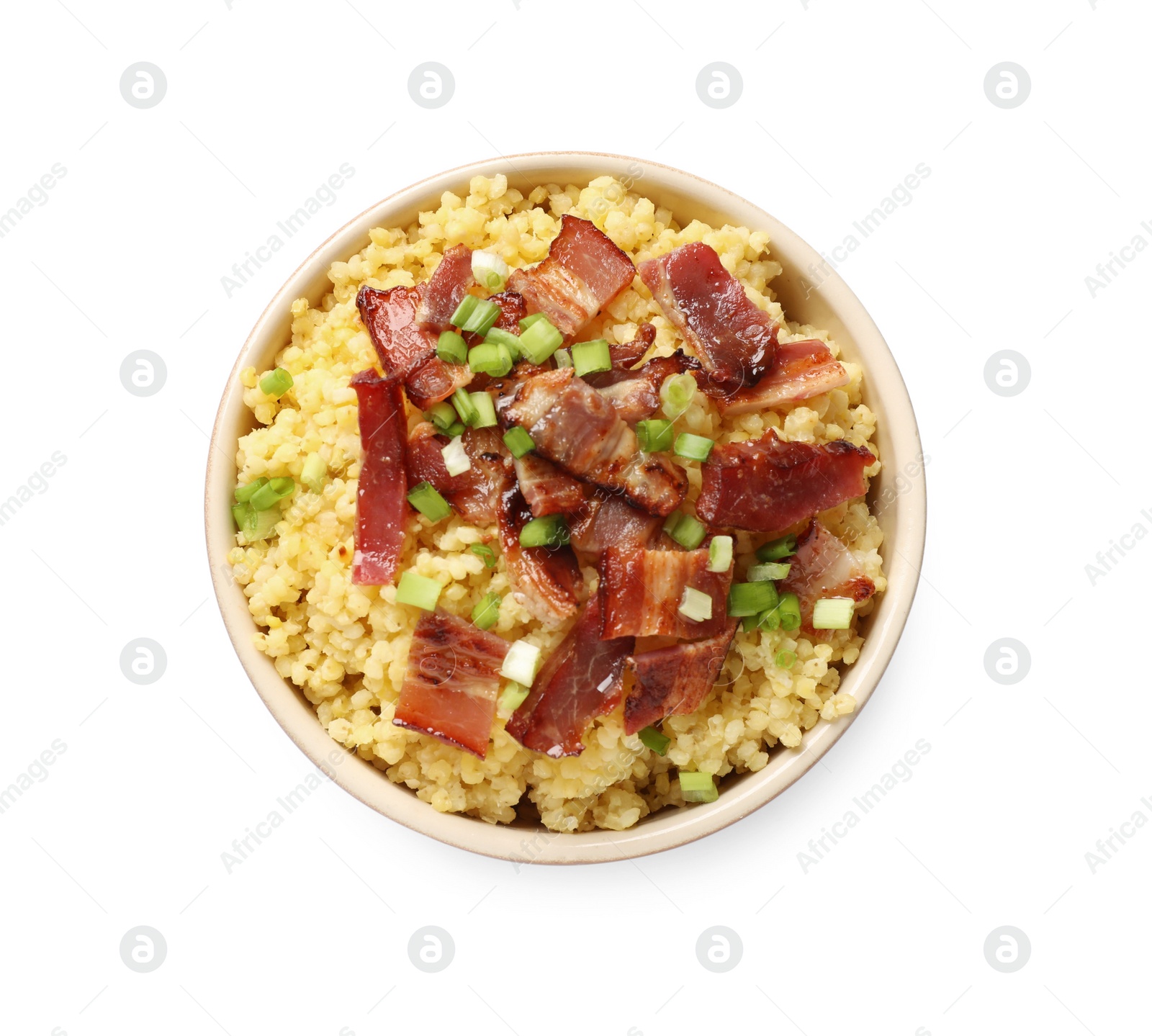 Photo of Tasty millet porridge with bacon and green onion in bowl isolated on white, top view