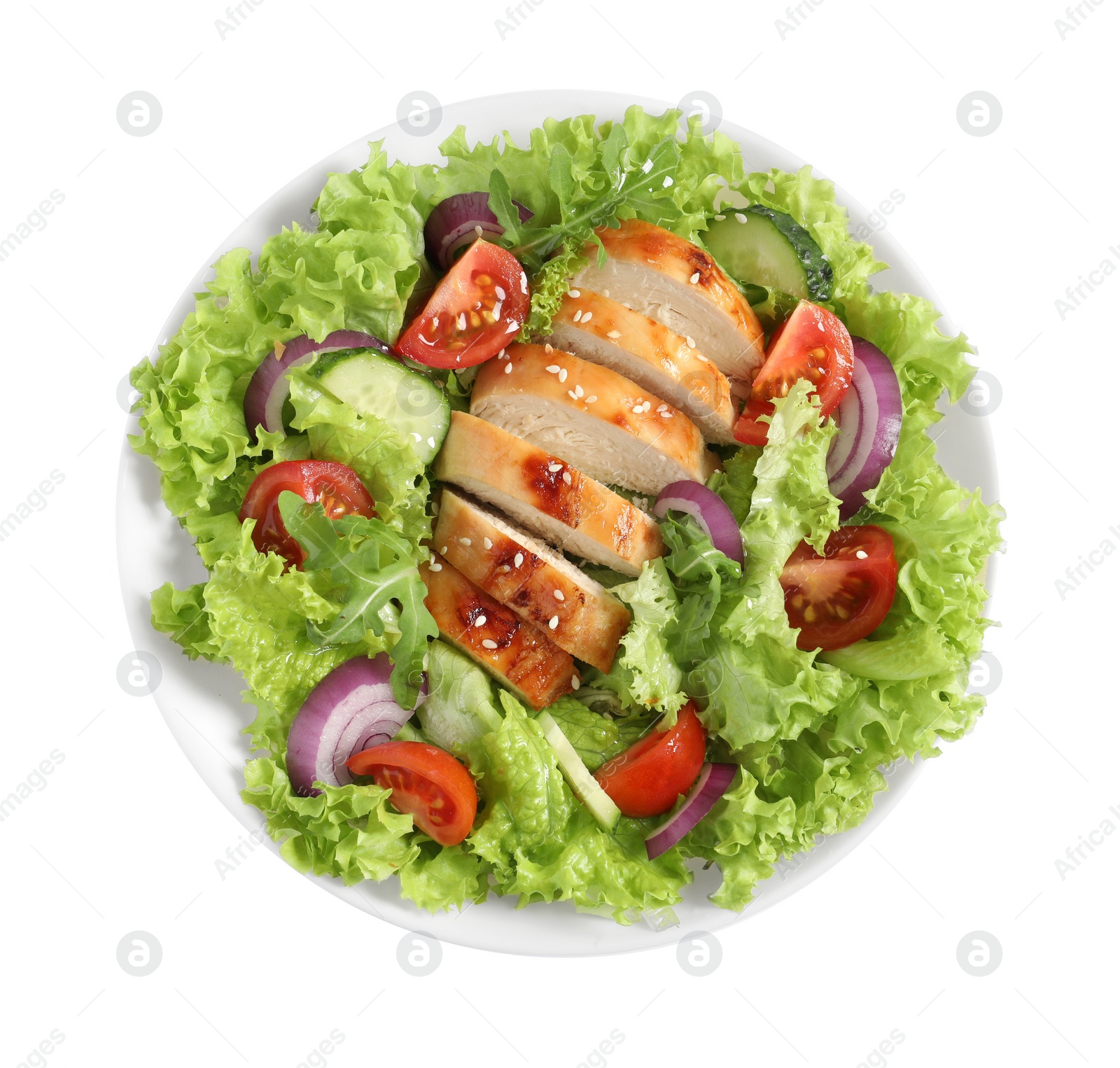 Photo of Delicious salad with chicken and vegetables in bowl isolated on white, top view