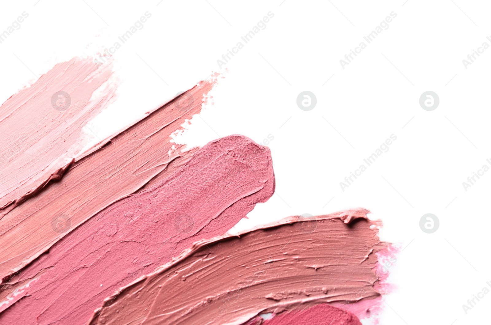 Photo of Lipstick smears isolated on white. Space for text