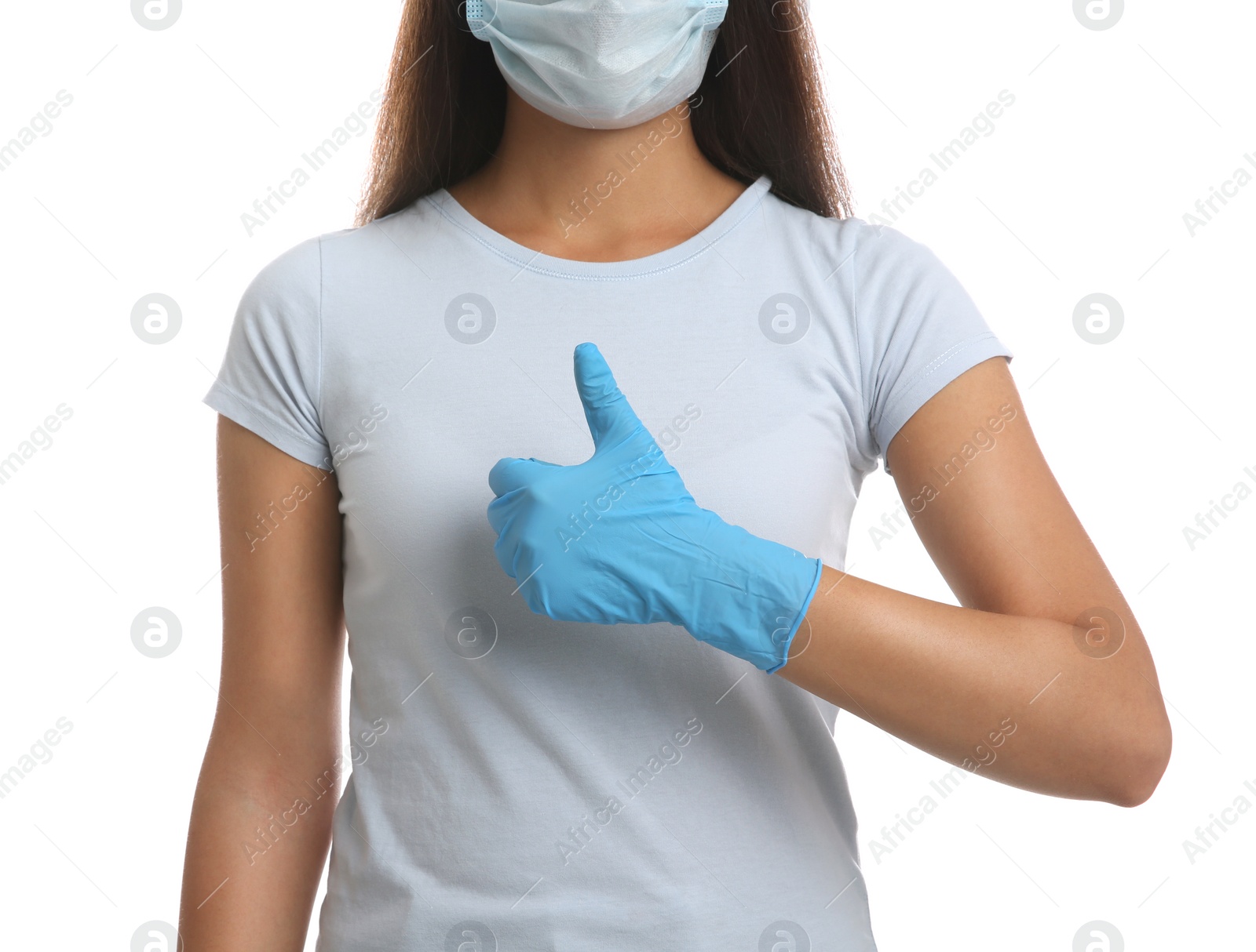 Photo of Woman in protective face mask and medical gloves showing thumb up gesture on white background, closeup
