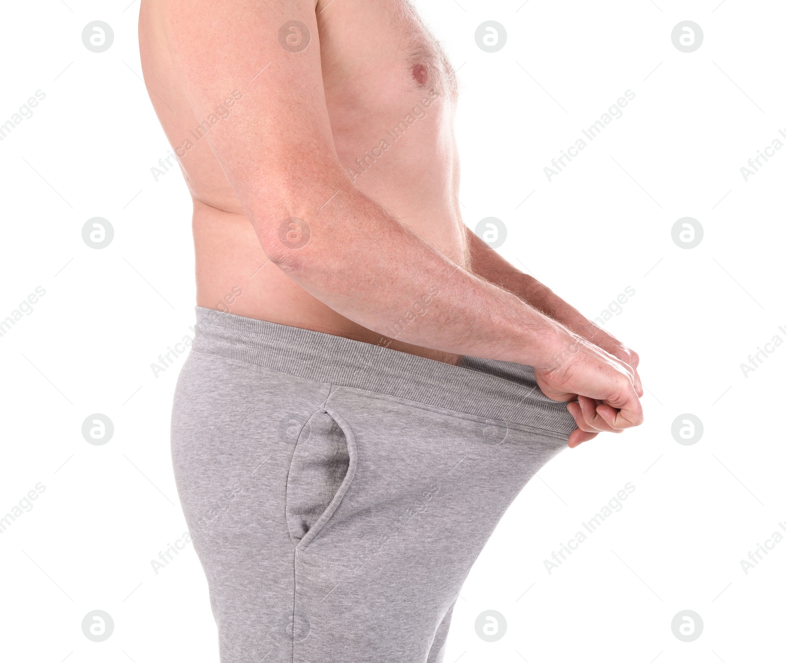 Photo of Mature man with urological problems on white background