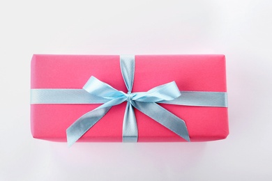 Photo of Beautiful gift box with ribbon on white background