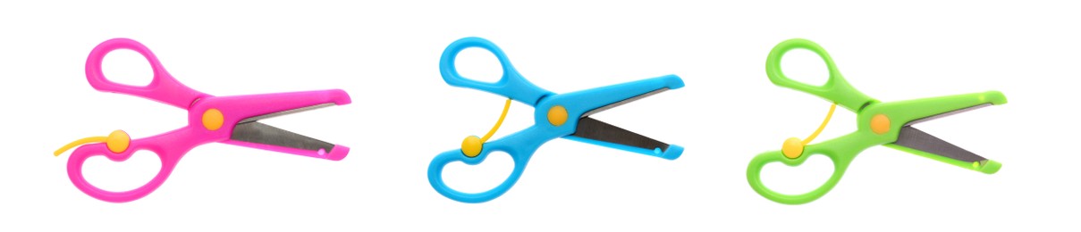 Image of Set with kid's color scissors on white background. Banner design