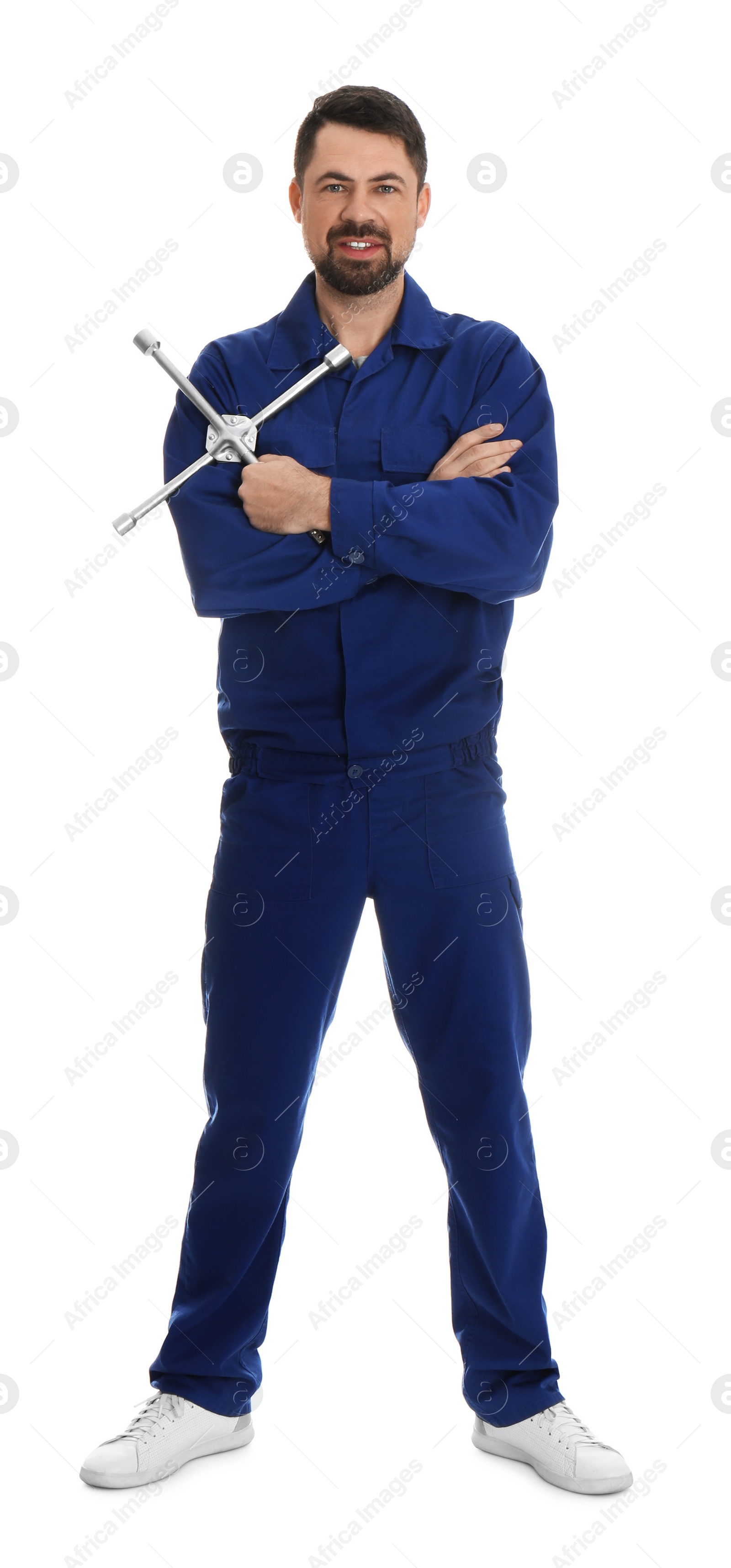 Photo of Full length portrait of professional auto mechanic with lug wrench on white background