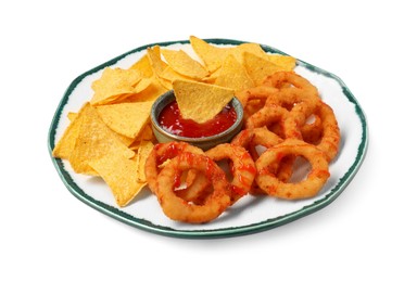 Photo of Tasty tortilla chips and fried onion rings with ketchup isolated on white